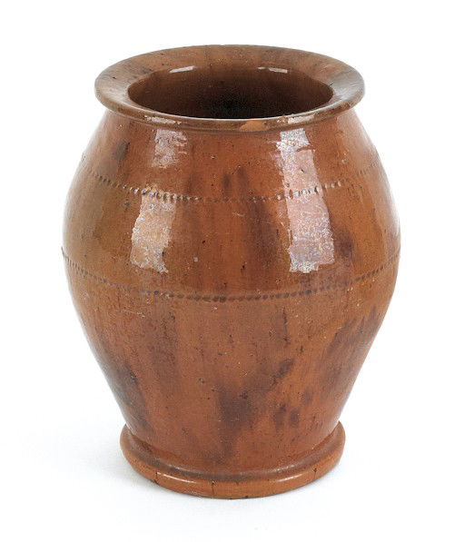 Pennsylvania redware crock with mottled green,: Pennsylvania redware crock with mottled green, orange, and brown glaze, 7'' h.