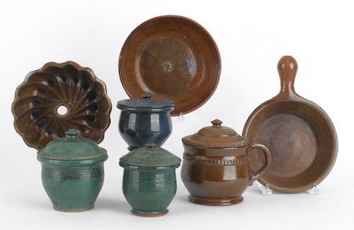 Collection of Stahl pottery redware, to include: Collection of Stahl pottery redware, to include five lidded crocks,a mold, a shallow bowl, and a pan.