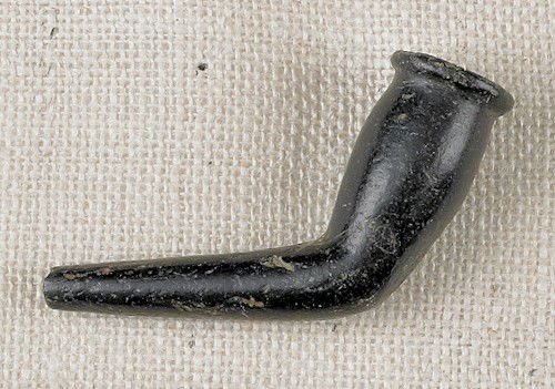 Green steatite obtuse angle pipe, overall - 5'': Green steatite obtuse angle pipe, overall - 5'' l. Provenance: Illig collection.