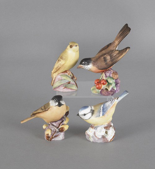 Four Royal Worcester porcelain birds, tallest - 4: Four Royal Worcester porcelain birds, tallest - 4'' h.