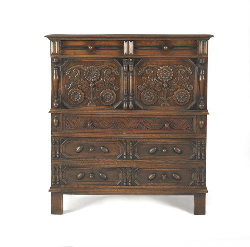 Kittinger carved oak sunflower chest, 44 1/2'' h.,: Kittinger carved oak sunflower chest, 44 1/2'' h., 37'' w.