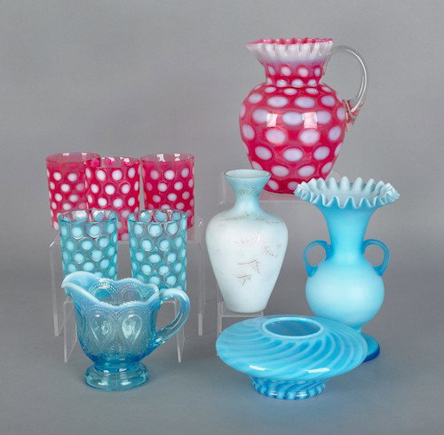 Glass tableware, to include a blue satin overlay: Glass tableware, to include a blue satin overlay vase, a cranberry overlay pitcher and glasses, etc., ten pieces.