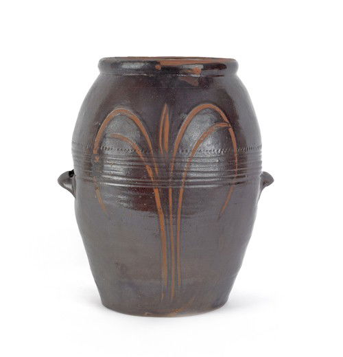 Redware crock, 19th c., with a foliate spray deco: Redware crock, 19th c., with a foliate spray decoration, 16'' h.
