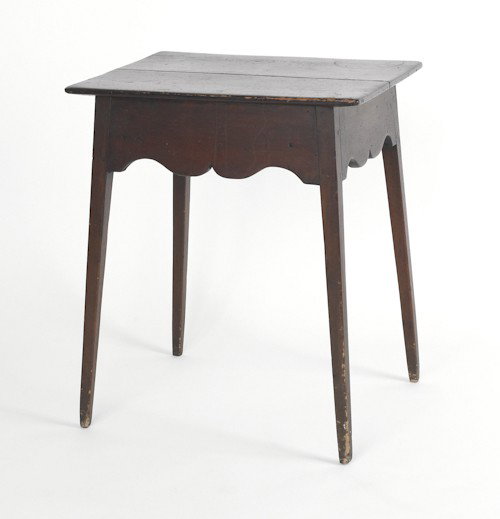 Hepplewhite end table, ca. 1800, with an oblong: Hepplewhite end table, ca. 1800, with an oblong top, scalloped skirt and splayed tapering square legs, 28'' h., 23 3/4'' w.