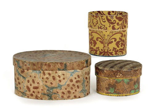 Three oval wallpaper boxes, 19th c., one with a: Three oval wallpaper boxes, 19th c., one with a recessed top and one with a pincushion top, 4 1/2'' h., 3 5/8'' h., 2 3/4'' h.