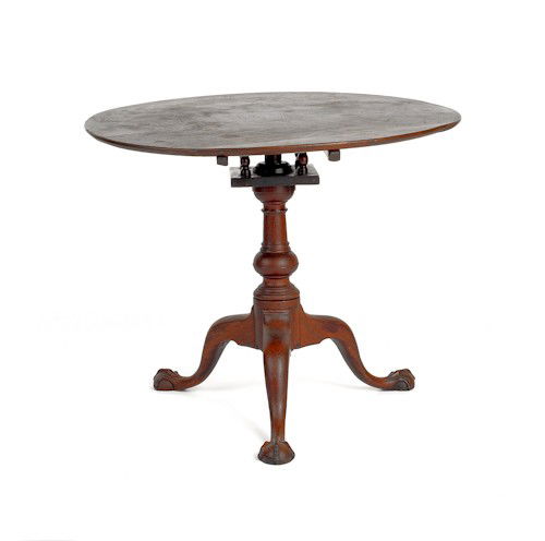 Philadelphia Chippendale mahogany tea table, ca.: Philadelphia Chippendale mahogany tea table, ca. 1770, with suppressed ball standard and ball and claw feet, 26 1/4'' h., 31'' w.