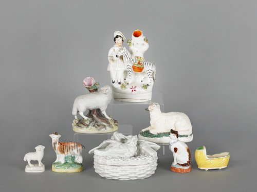 Eight Staffordshire tablewares, to include spill: Eight Staffordshire tablewares, to include spill vases, figures, a cradle, etc., tallest - 6 3/4'' h.
