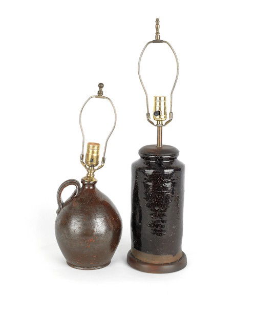 Redware ovoid jug, converted to an electric lamp,: Redware ovoid jug, converted to an electric lamp, 8'' h., together with a manganese crock converted to electric, 10 1/2'' h.