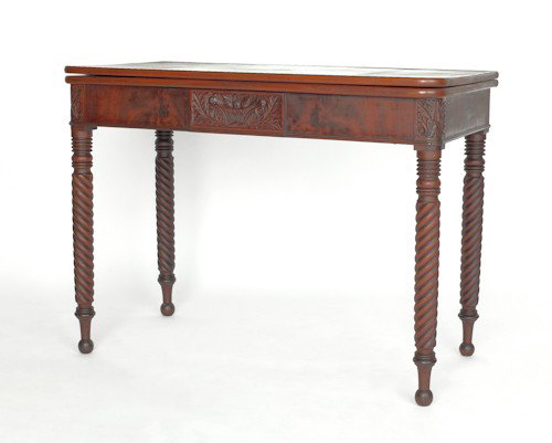 Sheraton mahogany card table, ca. 1815, with carv: Sheraton mahogany card table, ca. 1815, with carved facade and corners, 29 3/4'' h., 40'' w.