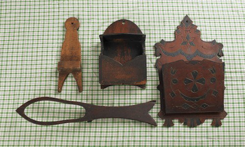 Two wooden wall pockets, 19th c., together with t: Two wooden wall pockets, 19th c., together with two wooden bootjacks, tallest - 22 3/4'' h.