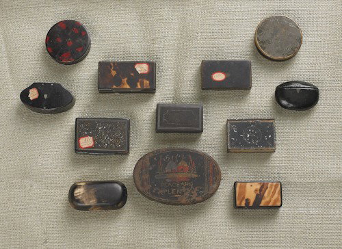 Eleven snuff boxes, 19th c., to include tortoise: Eleven snuff boxes, 19th c., to include tortoise shell, tin, and papier-m?ch?, together with a tin tinder box.