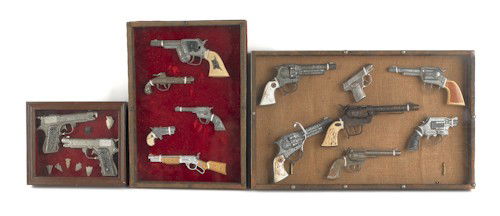 Fourteen framed cap guns, 20th c., most Hubley.: Fourteen framed cap guns, 20th c., most Hubley.