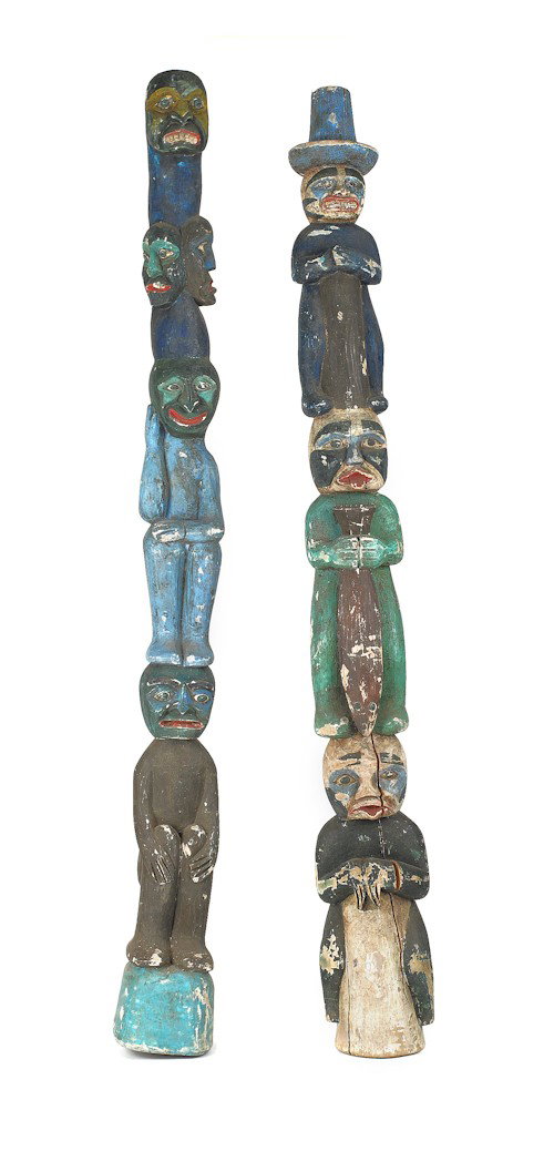 Pair of carved and painted totem poles, 98'' h. P: Pair of carved and painted totem poles, 98'' h. Provenance: Pennsylvania Museum.