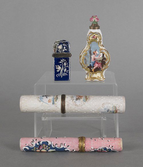 Four Continental enameled boxes, 19th c., to in: Four Continental enameled boxes, 19th c., to include two needle cases and two perfume bottles, largest - 5 1/4'' l.