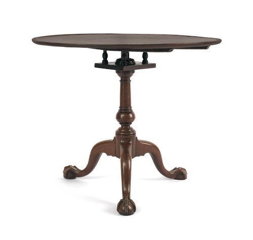 Pennsylvania Chippendale mahogany tea table, ca.: Pennsylvania Chippendale mahogany tea table, ca. 1770, with a suppressed ball standard and ball and claw feet, 28 1/2'' h., 34 3/4'' w.