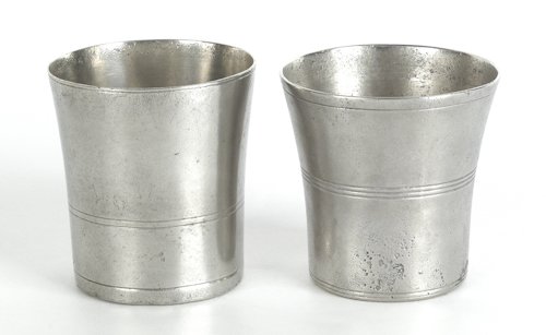 Two Wallingford, Connecticut pewter beakers, ca.: Two Wallingford, Connecticut pewter beakers, ca. 1830, bearing the touch of Hiram Yale, 3'' h. and 2 7/8'' h.