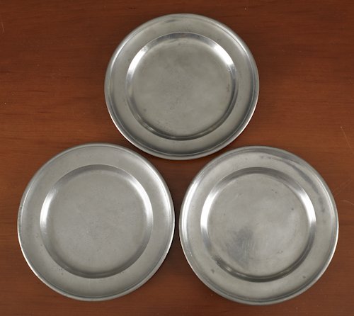 Two Meriden, Connecticut pewter plates, ca. 1820: Two Meriden, Connecticut pewter plates, ca. 1820, bearing the touch of Ashbil Griswold, 7 3/4'' dia., together with a pewter plate by Samuel Danforth, 8'' dia.