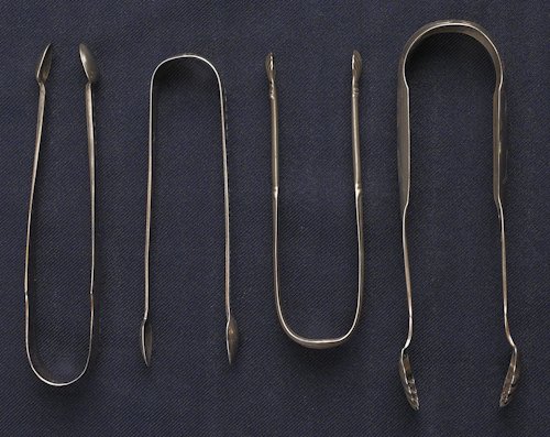 Collection of silver tongs to include sugar ton: Collection of silver tongs to include sugar tongs by Paul Revere, tongs by Watson, and two other silver tongs.