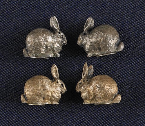 Cased set of Victorian silver gilt miniature sal: Cased set of Victorian silver gilt miniature salts in the form of rabbits, hallmarked W.H.