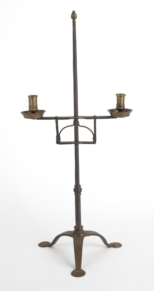 Wrought iron and brass adjustable table top cand: Wrought iron and brass adjustable table top candleholder with two cups and penny feet, 21 1/4'' h.