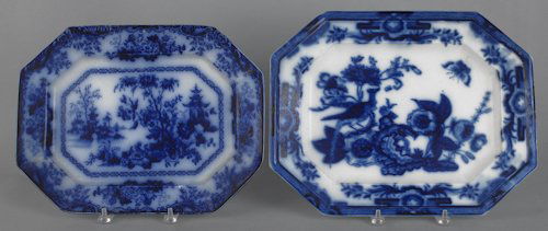 Two flow blue platters, 19th c., one in the Rhoda: Two flow blue platters, 19th c., one in the Rhoda Gardens pattern, 12 1/2'' l., 16'' w. and one in a pheasant pattern, 13 1/2'' l., 17'' w.