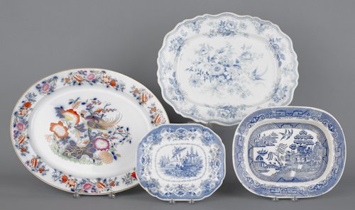 Four ironstone/Staffordshire platters, 19th c., t: Four ironstone/Staffordshire platters, 19th c., to include Gaudy pheasant, Asiatic pheasants, Blue Willow, and oriental, largest - 16'' l., 20'' w.