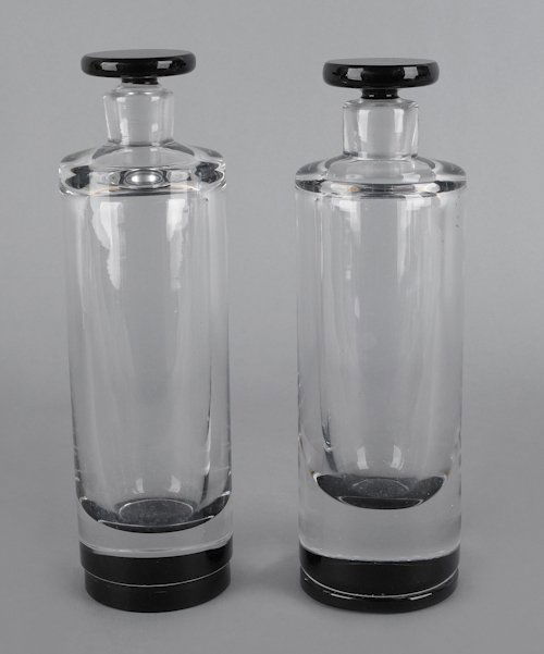 Pair of Orrefors colorless and smoky glass bottle: Pair of Orrefors colorless and smoky glass bottles, signed on base, 10 1/4'' h.