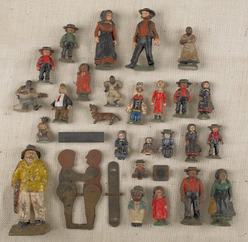 Large collection of painted cast iron figures, 20: Large collection of painted cast iron figures, 20th c., to include Popeye, black Americana, and Amish figures, etc., tallest - 6 1/2''.
