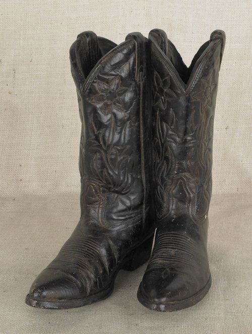 Continental metal sculpture of cowboy boots, date: Continental metal sculpture of cowboy boots, dated 1982, inscribed Austin Prod., 15'' h.