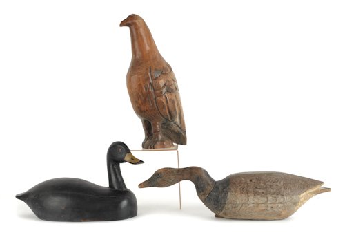 Two carved and painted duck decoys, mid 20th c.,: Two carved and painted duck decoys, mid 20th c., together with a contemporary carved figure of an eagle, signed C. Boyd, tallest - 17 1/2''.