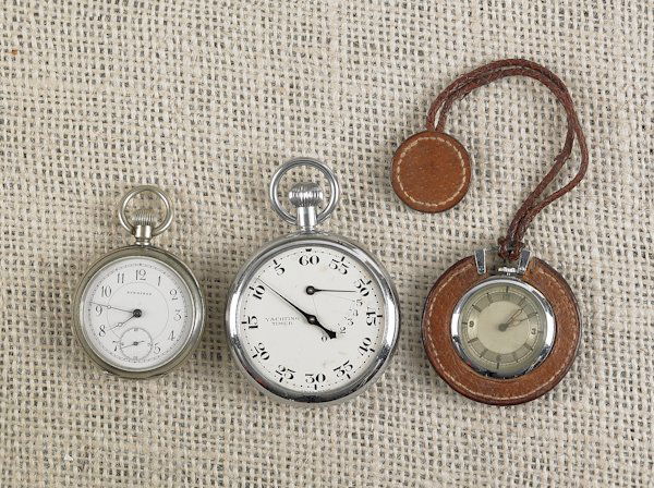 A. Wyler see through back pocket watch, together: A. Wyler see through back pocket watch, together with a Longines pocket watch and a Swiss stopwatch.