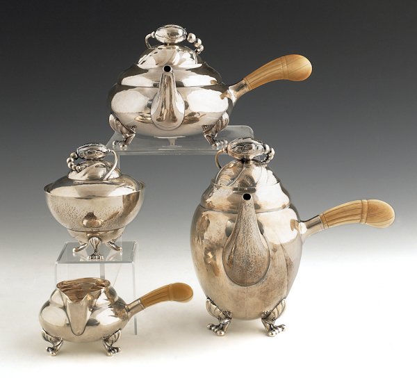 Georg Jensen blossom pattern silver four-piece t: Georg Jensen blossom pattern silver four-piece tea and coffee service, coffee pot - 7 3/4'' h., 52 ozt.