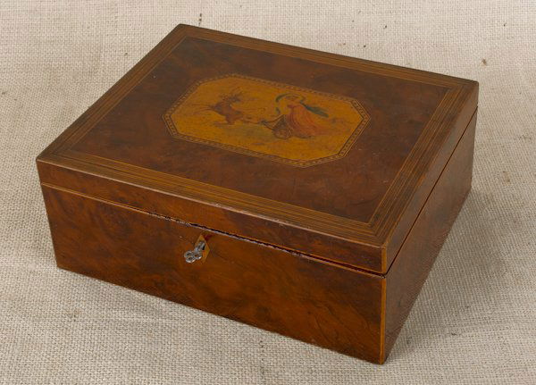 Burl veneer sewing box, mid 19th c., with a fit: Burl veneer sewing box, mid 19th c., with a fitted interior and a variety of accoutrements, to include needle cases, spools, hand done pocket watch inserts, etc., 4'' h., 10 1/2'' w.