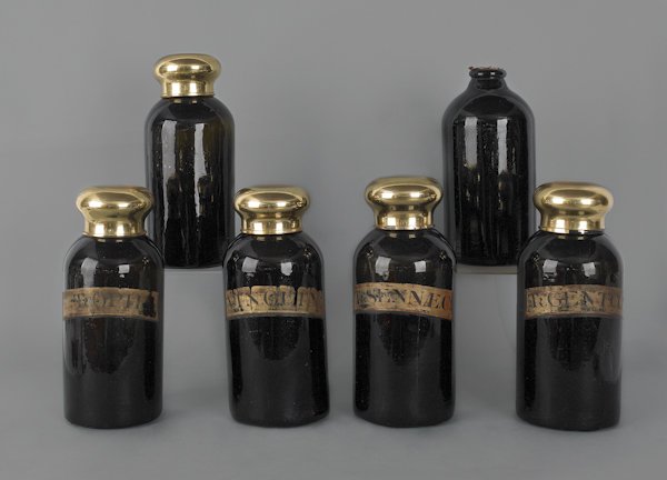 Set six olive glass apothecary jars, 19th c., w: Set six olive glass apothecary jars, 19th c., with painted labels, 13 3/4'' h.
