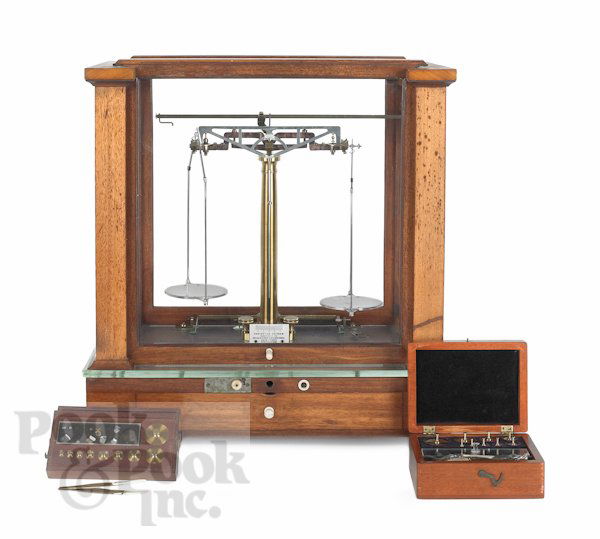 New York mahogany cased scale by Christian Becker: New York mahogany cased scale by Christian Becker, 18'' x 16'', together with two cased sets of weights.