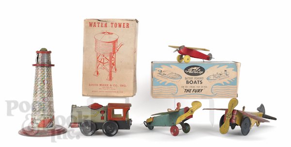 Group of miscellaneous toys, 20th c., to include: Group of miscellaneous toys, 20th c., to include a Marx tin wind-up airplane, a Fleet Line battery operated boat with its original box, a Marx water tower with a box, etc.