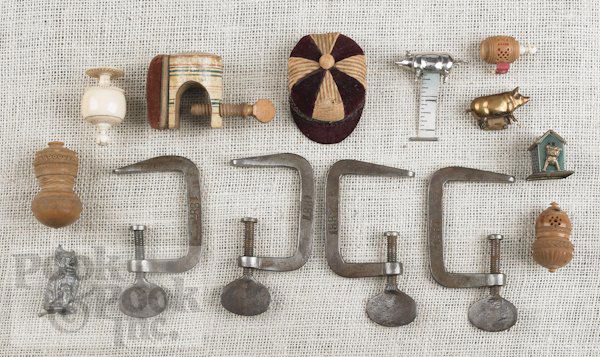 Collection of sewing accessories, to include a se: Collection of sewing accessories, to include a set of four iron clamps, dated 1887, tape measures, a pincushion, etc.