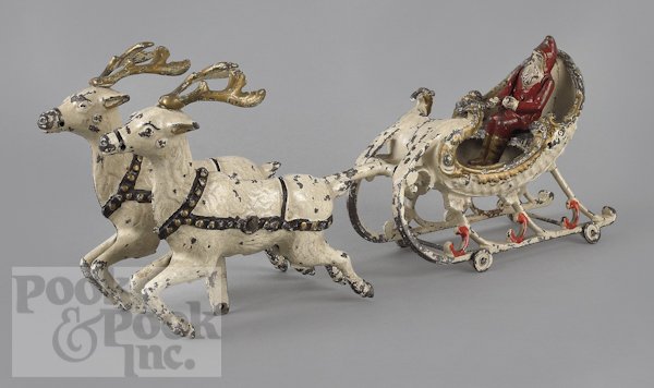 Hubley cast iron Santa Claus in a sleigh, ca. 190: Hubley cast iron Santa Claus in a sleigh, ca. 1900, 16 1/2'' l.