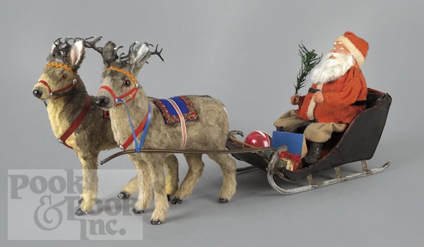 Composition Santa Claus in a sleigh, early 20th c: Composition Santa Claus in a sleigh, early 20th c., pulled by two reindeer, 13 1/2'' l.