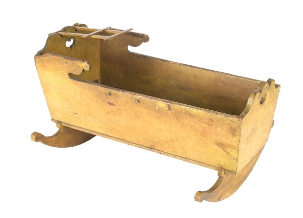 Pennsylvania painted cradle, 19th c., with hear: Pennsylvania painted cradle, 19th c., with heart cuttout ends, retaining an old yellow surface.