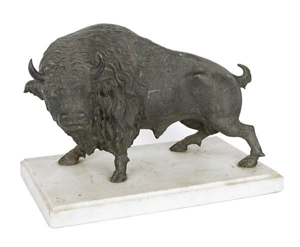 Spelter statue of a buffalo, late 19th c., mounte: Spelter statue of a buffalo, late 19th c., mounted to a marble base, 14'' h., 21'' l.