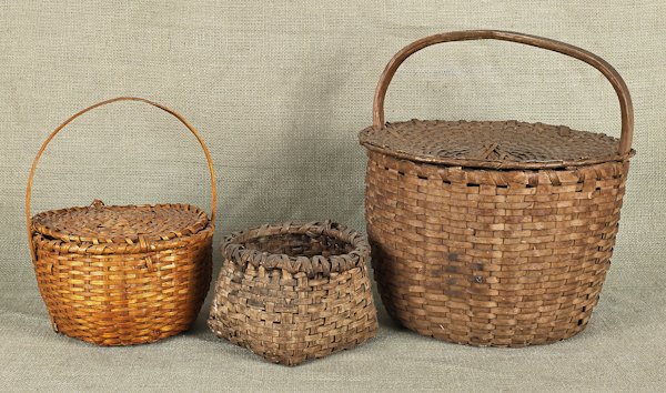 Three splint baskets, 19th c., two with lids, lar: Three splint baskets, 19th c., two with lids, largest - 14'' h., 13'' dia.