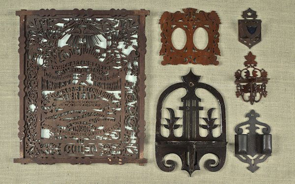Collection of carved wall shelves, fretwork pictu: Collection of carved wall shelves, fretwork picture frames, and a carved mirror, ca. 1900.