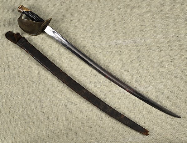 U.S. Naval cutlass with a scabbard, unmarked, bla: U.S. Naval cutlass with a scabbard, unmarked, blade - 25 3/4'' l.