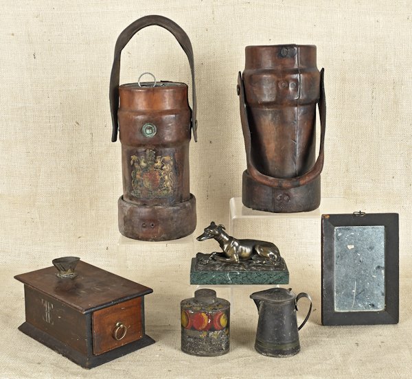 Miscellaneous table articles, to include two leat: Miscellaneous table articles, to include two leather buckets, a ballot box, dated 1867, a tableware caddy and creamer, a bronze recumbent dog, and a small veneered mirror, tallest - 12 1/2''.
