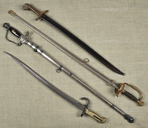 Four swords, to include a French bayonet, a Mason: Four swords, to include a French bayonet, a Masonic lodge sword, etc.