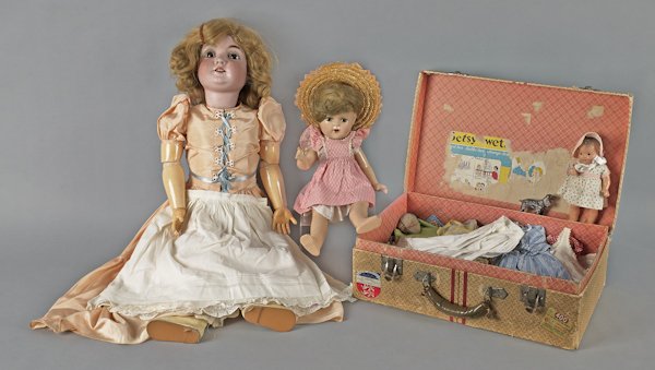 German bisque doll, inscribed M 16 104, with jo: German bisque doll, inscribed M 16 104, with jointed kid body, 38'' h., together with a composition Madame Alexander Princess Elizabeth doll, miscellaneous clothes, etc.