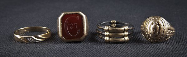 10K gold school ring, together with a 10K gold ri: 10K gold school ring, together with a 10K gold ring with a carved carnelian, a 14K gold wedding band with two accent diamonds, and a gold-filled band with a shank (possibly quill), 10.8dwt.