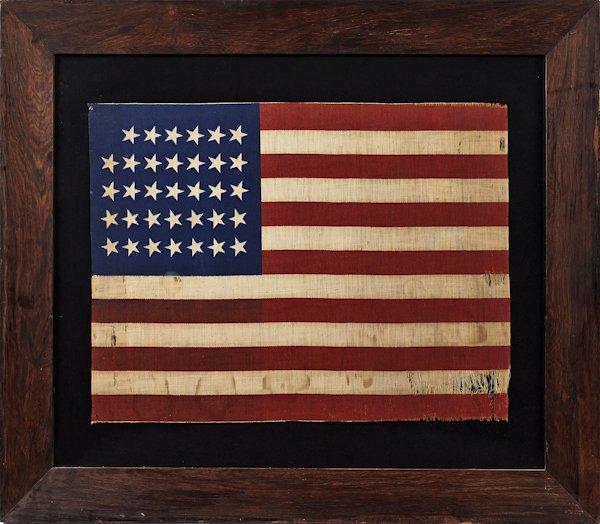 American thirty-four star wool flag, ca. 1861-18: American thirty-four star wool flag, ca. 1861-1863, 17'' x 22 3/4''.