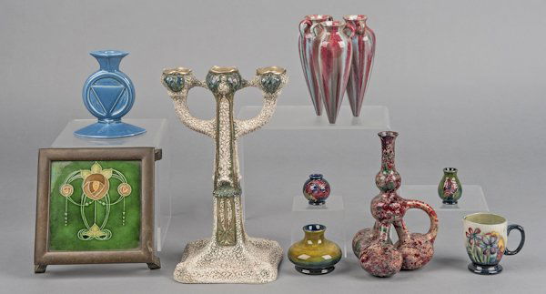 Collection of art pottery, 20th c., to include fo: Collection of art pottery, 20th c., to include four pieces of Moorcroft, Cowan, an Austrian candelabra, a trivet with brass mounts, etc., tallest - 12''.